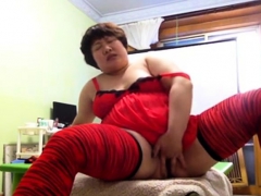 Chubby Asian teen in red