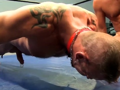 Hunky guy makes his boyfriend do pushups in the ring